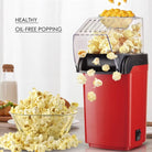Contemporary Popcorn Maker With Slide-Out Chute